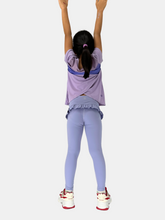 girls purple leggings with ruffle with short sleeve tee outfit back