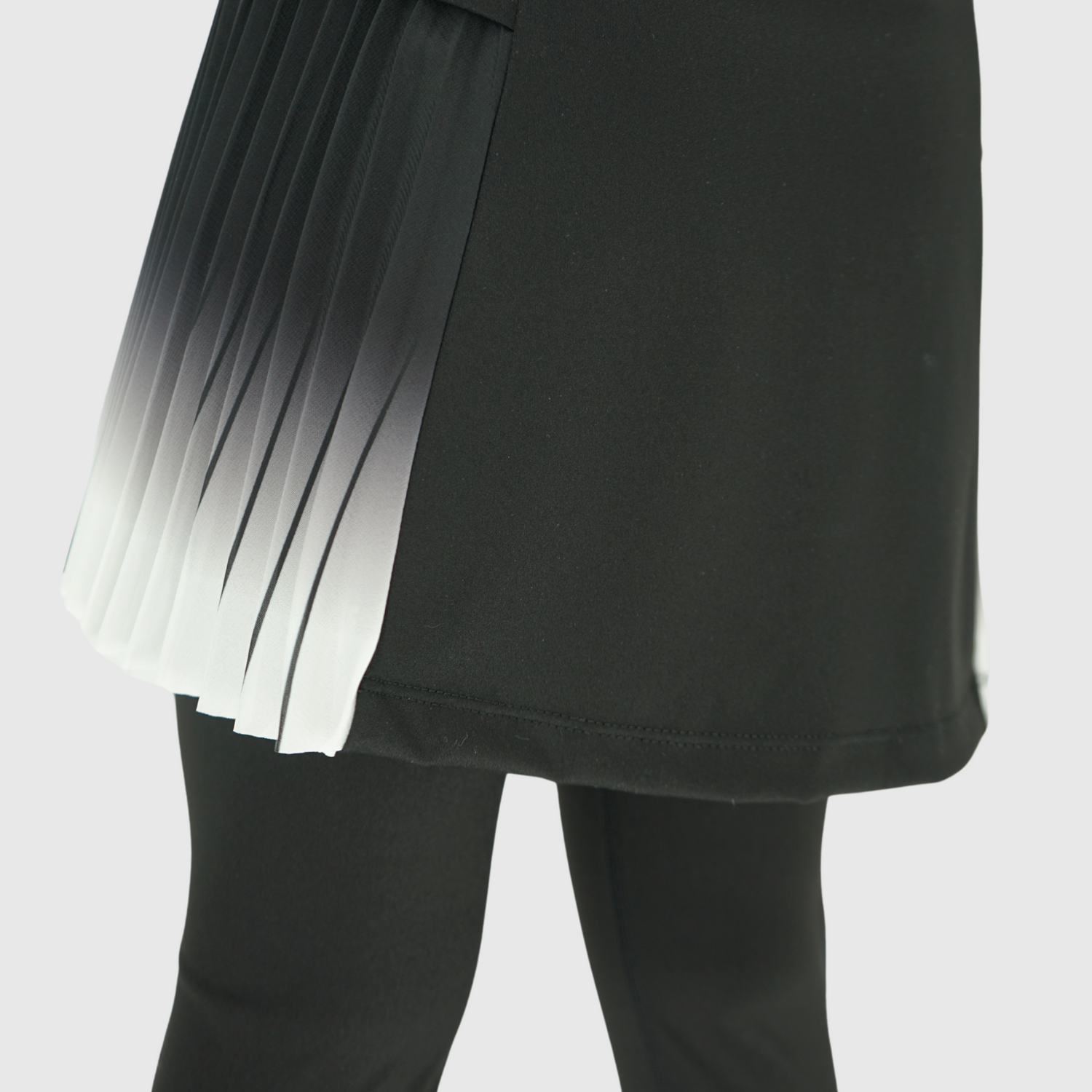 girls black leggings with pleated skirt details