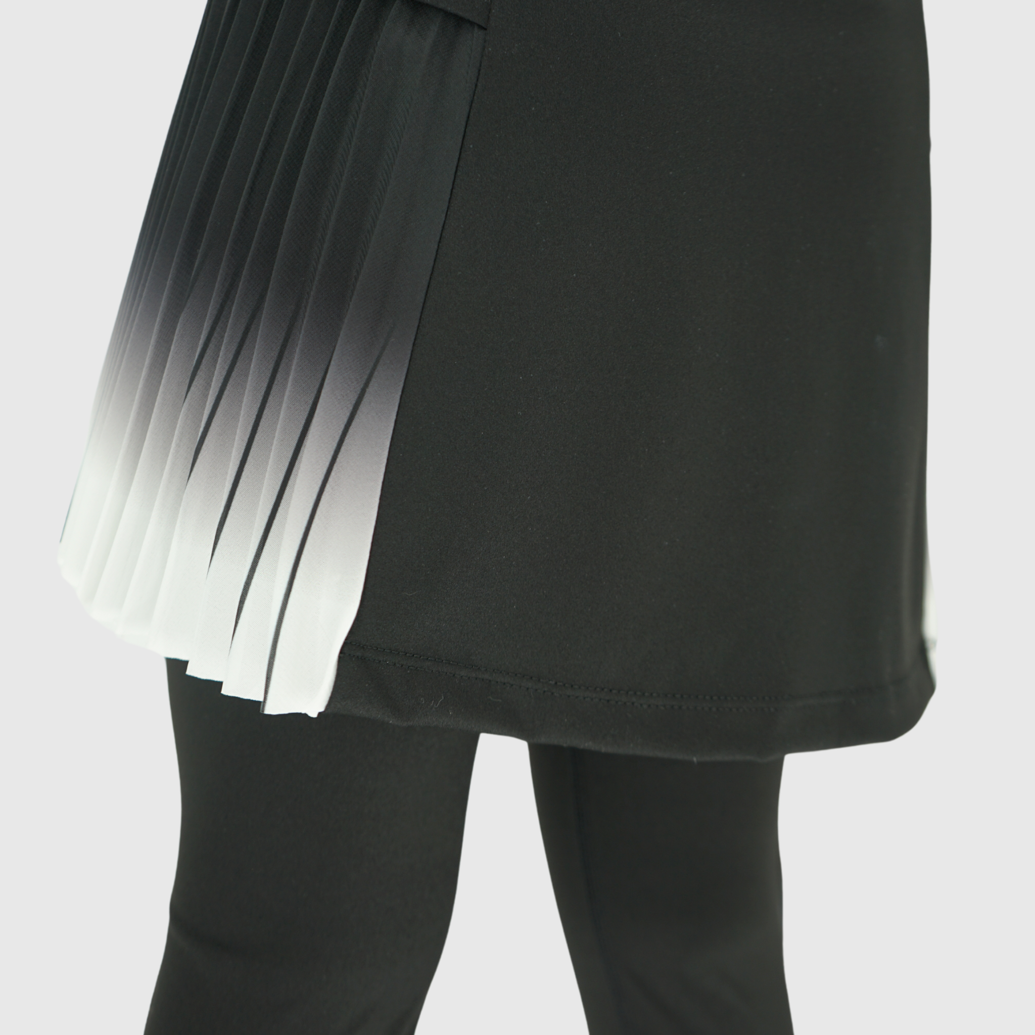 girls black leggings with pleated skirt details