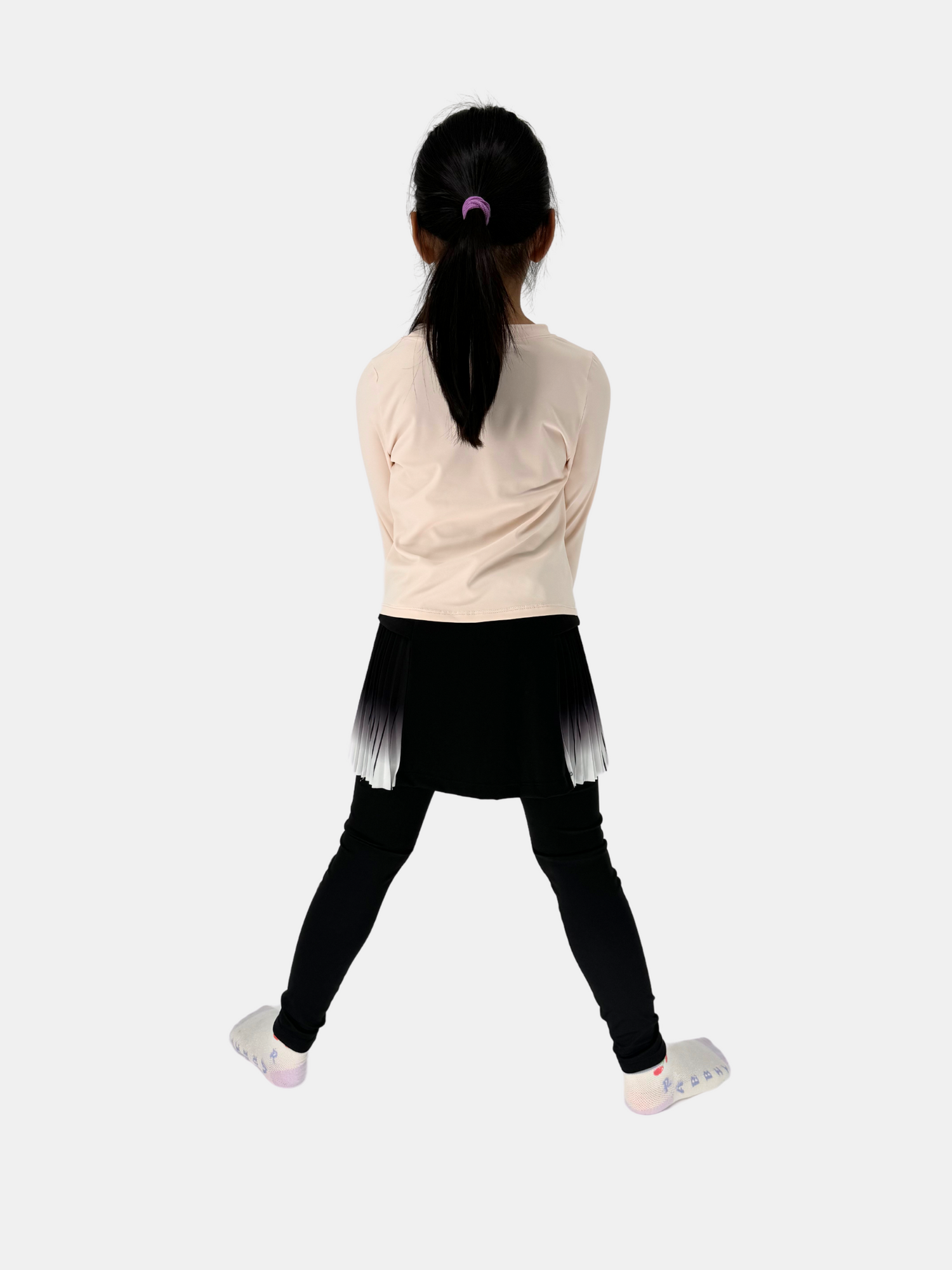 girls black leggings with pleated skirt model back